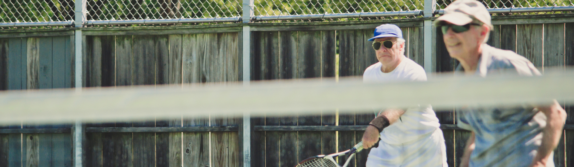 A couple playing tennis