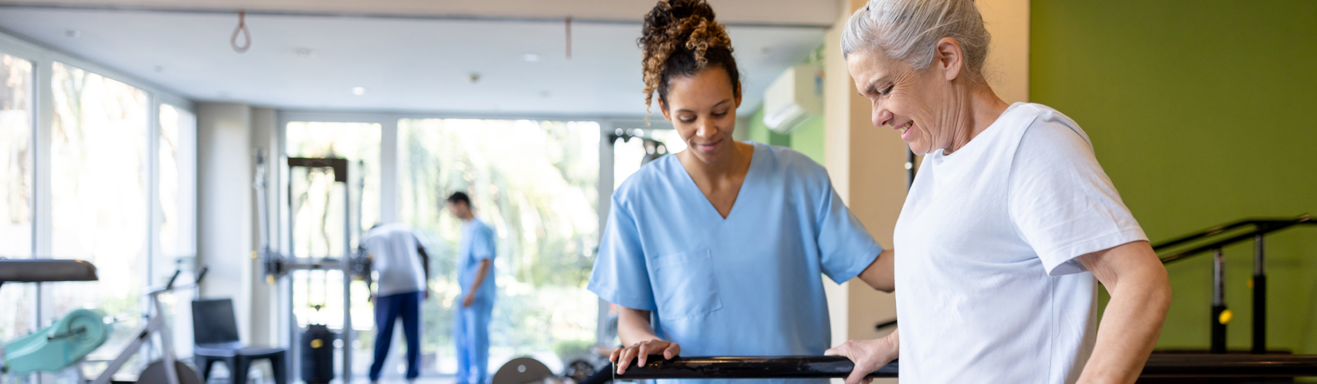 Nurse helping a patient walk
